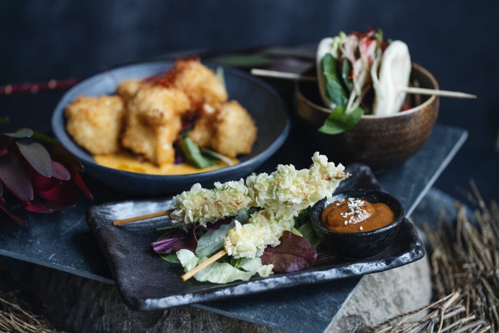 Spicy peanut sauce with vegetable tempura and crispy tofu